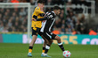  Newcastle United's Bruno Guimaraes in action with Wolverhampton Wanderers' Luke Cundle  d...