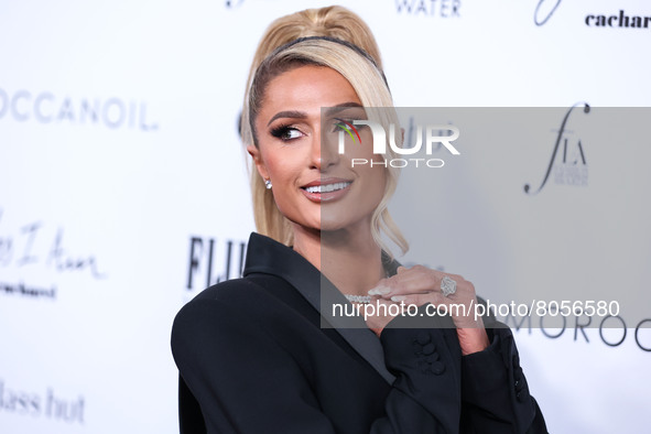 Paris Hilton wearing an outfit by Area arrives at The Daily Front Row's 6th Annual Fashion Los Angeles Awards presented by Yes I Am Cacharel...
