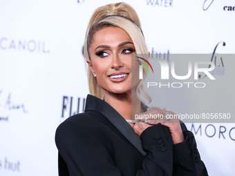 Paris Hilton wearing an outfit by Area arrives at The Daily Front Row's 6th Annual Fashion Los Angeles Awards presented by Yes I Am Cacharel...