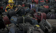 A worker arranges luggage during the Operational Readiness and Airport Transfer (ORAT) at...