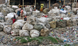 Workers during work at a plastic recycling factory beside the river Buriganga in Dhaka, Ba...