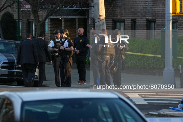 Police search a U-Haul truck in New York City suspected to be driven by the gunman that opened fire on an N Train today, April 12, 2022 inju...