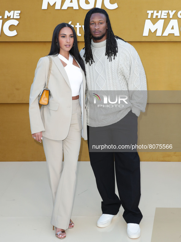 Diana DiFazio and Todd Gurley arrive at the Los Angeles Premiere Of Apple's 'They Call Me Magic' held at the Regency Village Theatre on Apri...