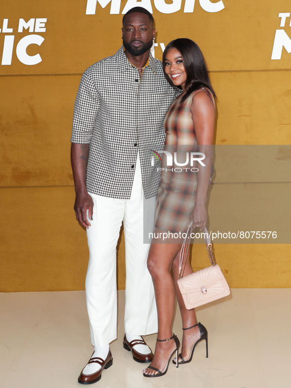 Dwyane Wade and Gabrielle Union arrive at the Los Angeles Premiere Of Apple's 'They Call Me Magic' held at the Regency Village Theatre on Ap...