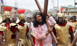 Members of Our Lady of the Holy Rosary Catholic Church hold Stations of the Cross to mark...