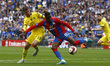  Crystal Palace's Wilfried Zaha holds of Chelsea's Mason Mountduring FA Cup Semi-Final bet...