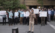 A group of Iranian men shout slogans to condemn Koran Burning in the Sweden, during a prot...