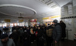 KYIV, UKRAINE - APRIL 18, 2022 - People stand in a queue inside the Central Post Office to...