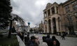 KYIV, UKRAINE - APRIL 18, 2022 - People stand in a queue outside the Central Post Office t...