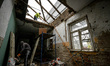 ZAPORIZHZHIA, UKRAINE - APRIL 16, 2022 - Labourers work to repair a 70-year-old building s...