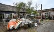 ZAPORIZHZHIA, UKRAINE - APRIL 16, 2022 - Old equipment is piled in the yard of a 70-year-o...