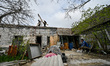 ZAPORIZHZHIA, UKRAINE - APRIL 16, 2022 - Labourers work to repair a 70-year-old building s...