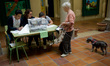 An woman casts his vote at a polling station in Barcelona on 27 Sept. 2015, Spain. The res...