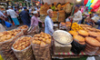A man is seen selling various types of bread , during Ramadan time in Kolkata , India , on...