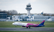 Wizz Air Airbus A321-231 HA-LXP and Polish Air Navigation Services Agency (in background)...