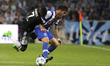 Porto's Portuguese midfielder Ruben Neves (R) vies with Chelsea's Brazilan midfielder Rami...