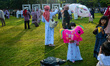 A young girl holds a balloon after praying Eid al-Fitr at a park in Bogor, West Java, Indo...