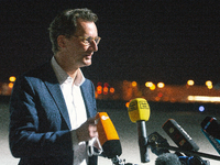 State Minister Hendrik Wüst is seen speaking to the press before German astronaut Matthias Maurer returns to Cologne, Germany on May 7, 2022...