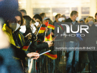 fans are seeing waving the German flags waiting to German astronaut Matthias Maurer arrives at  Federal Defence transportwing in Cologne, Ge...