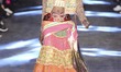 A model walks the runway during the Manish Arora show as part of the Paris Fashion Week Wo...
