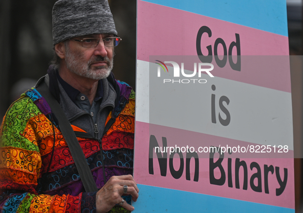 An activist holds a placard with words 'God is Non Ninary'.
More than 100 local LGBTQ2S + supporters gathered Friday evening at the southeas...