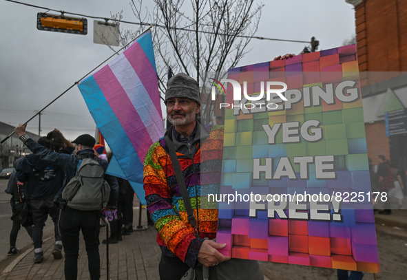 An activist holds a placard with words 'Keeping YEG Hate Free!'.
More than 100 local LGBTQ2S + supporters gathered Friday evening at the sou...