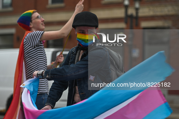 More than 100 local LGBTQ2S + supporters gathered Friday evening at the southeast corner of Whyte Avenue and 104 Street to celebrate the cit...