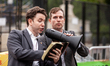 Comedian Walter Masterson and Max perform as Christian pro-life activists reading from the...