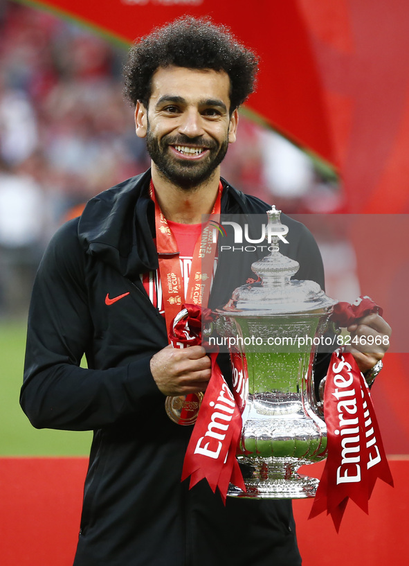 Liverpool's Mohamed Salah with the FA Cup after their sides 6-5 penalty shoot-out after a 0-0 draw in normal time FA Cup Final between Chel...