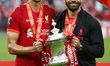 L-R Liverpool's Trent Alexander-Amold and Liverpool's Mohamed Salah with the FA Cup after...