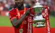 Liverpool's Sadio Mane holds  the FA Cup after their sides 6-5 penalty shoot-out after a 0...