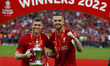  Liverpool's James Milner  holds the FA Cup with Liverpool's Jordan Henderson after their...
