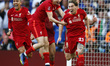 Liverpool's Kostas Tsimikas celebrates after scoring the goal in the penalty shoot out dur...