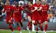 Liverpool's Kostas Tsimikas celebrates after scoring the goal in the penalty shoot out dur...