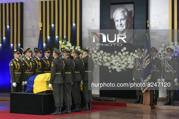 An honor guard stands near the coffin of Ukrainian first president Leonid Kravchuk during his funeral ceremony in Kyiv, Ukraine, May 17, 202...