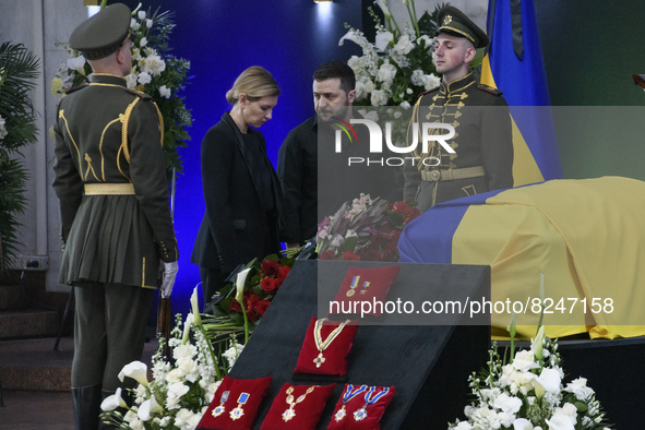 Ukraine's President Volodymyr Zelensky and his wife Olena Zelenska stay near the coffin of Ukrainian first president Leonid Kravchuk during...