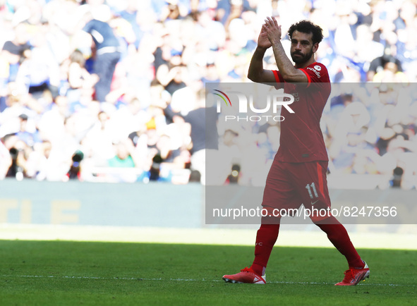 Liverpool's Mohamed Salah comes of injured during FA Cup Final between Chelsea and Liverpool at Wembley Stadium , London, UK 14th May , 2022...