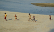 Indian kids play in sands on the dry river bed side of Ganges River,in Allahabad on Octobe...