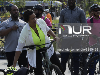 DC Mayor Muriel Bowser arrives on bike during Bike to Work Day event, today on February 25, 2021 at HVC/Capitol Hill in Washington DC, USA....