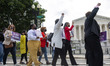 The The National Coalition on Black Civic Participation holds a rally and silent protest o...