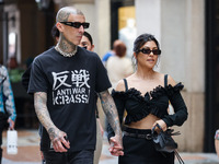 Kourtney Kardashian and Travis Barker are seen at Piazza Duomo on May 26, 2022 in Milan, Italy (