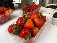 Strawberries are seen on a stand in Krakow, Poland on May 24, 2022. (