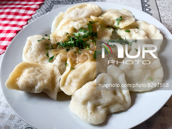 Filled dumplings called Pierogi are seen in a milk bar's table in Krakow, Poland on May 24, 2022. (
