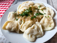 Filled dumplings called Pierogi are seen in a milk bar's table in Krakow, Poland on May 24, 2022. (