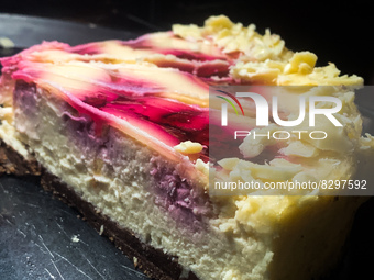 White chocolate fruit cheesecake is seen in a cafe in Krakow, Poland on May 24, 2022. (