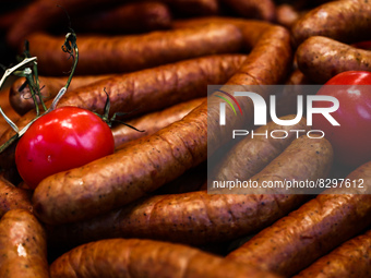Sausages are seen on a stand in Krakow, Poland on May 25, 2022. (