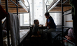 TIACHIV, UKRAINE - MAY 28, 2022 - Vira and her son Bohdan, 4, who fled their home in Sumy...