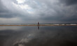  Palestinian boy walking on the Sea of Gaza City beach on a rainy day in  Gaza City Octobe...