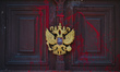 The door of the Russian Consulate General in Krakow has been covered with red paint since...