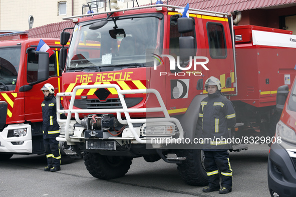 KYIV, UKRAINE - MAY 30, 2022 - Rescuers are pictured next to the firefighting and other special vehicles handed over for the needs of the SE...